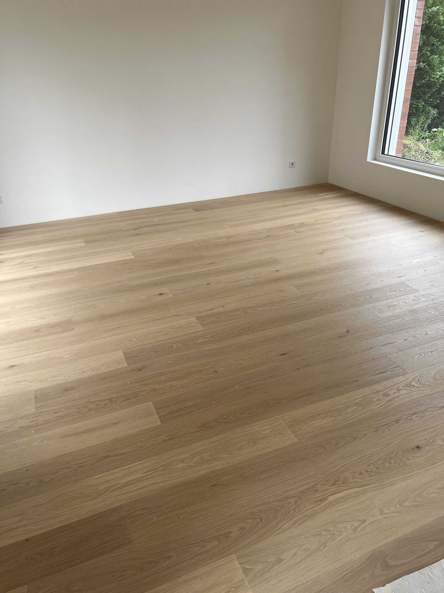 Parkett & Treppe aus einem Guss – gleiche Farbe, gleiches Material